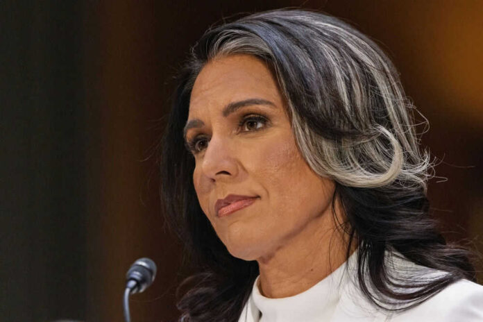 Person speaking in front of a microphone visible