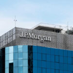 JPMorgan building with blue glass facade sky background