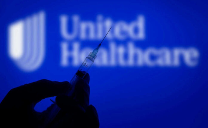 Syringe silhouette with United Healthcare logo background