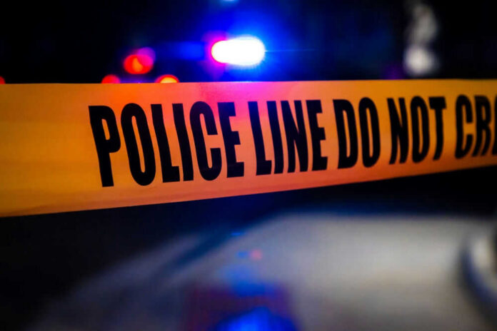 2408118125 Police tape at a crime scene night lighting