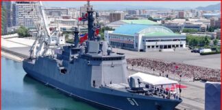 North Korea's Kim claims progress on nuclear-armed navy as new warship is placed into service