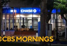 Man with apparent bomb barricaded with hostages inside Southern California bank