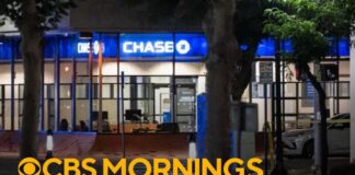 Man with apparent bomb barricaded with hostages inside Southern California bank