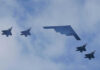 190 km Kill — Or Propaganda Play? Five military aircraft flying in formation under clouds